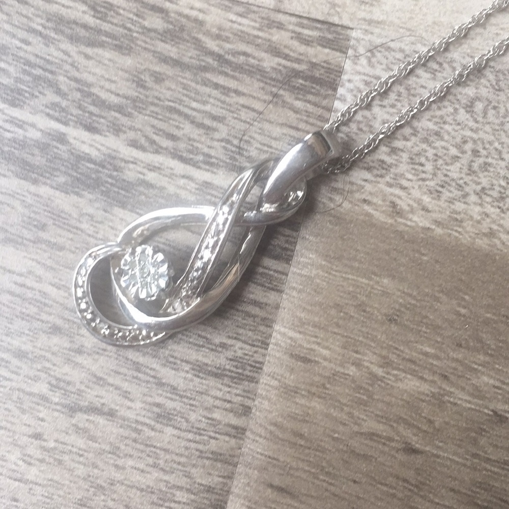 Diamond Necklace has 1 tiny real diamond in middle
